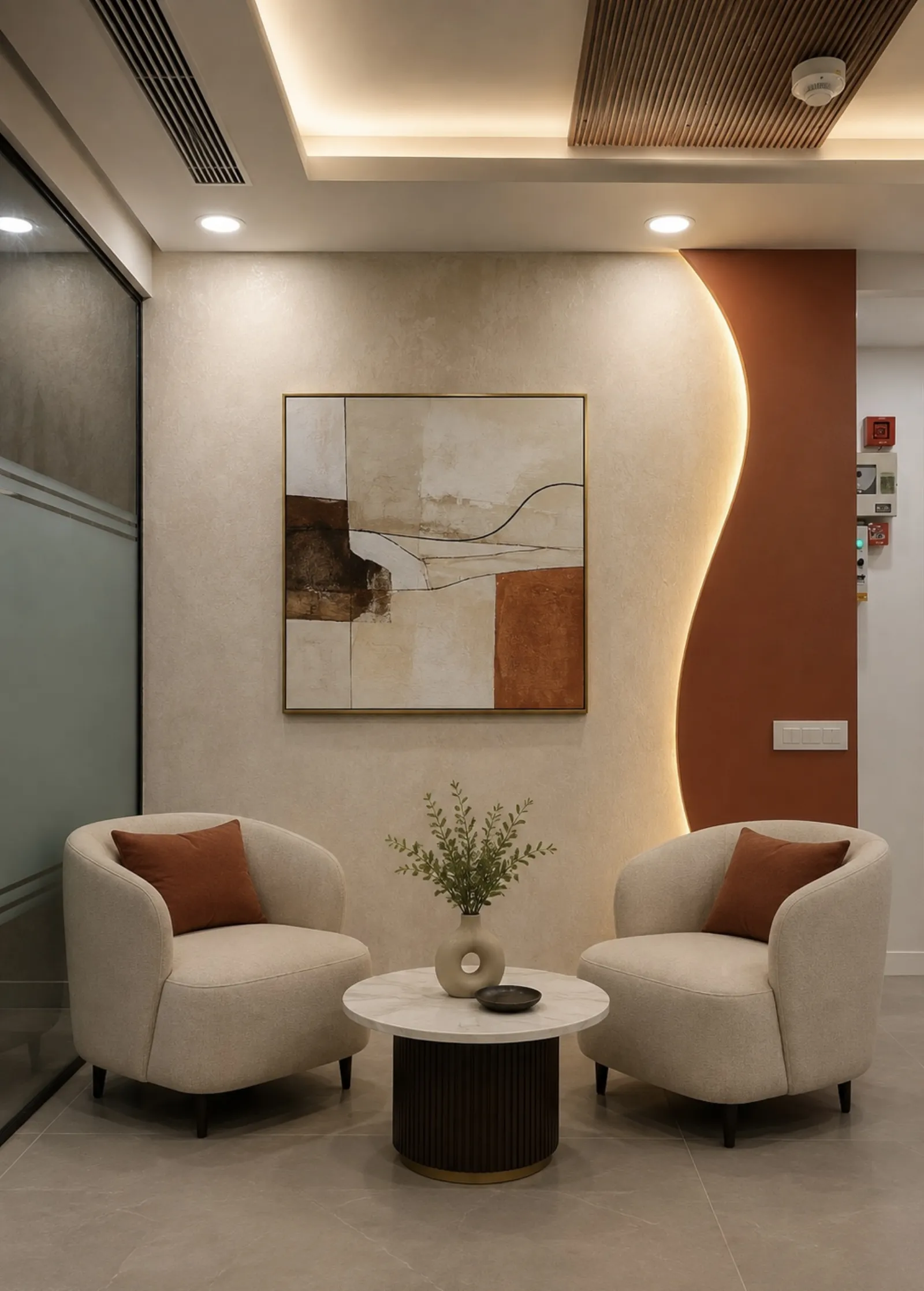 Reception lounge with a sculptural terracotta curved backlit wall