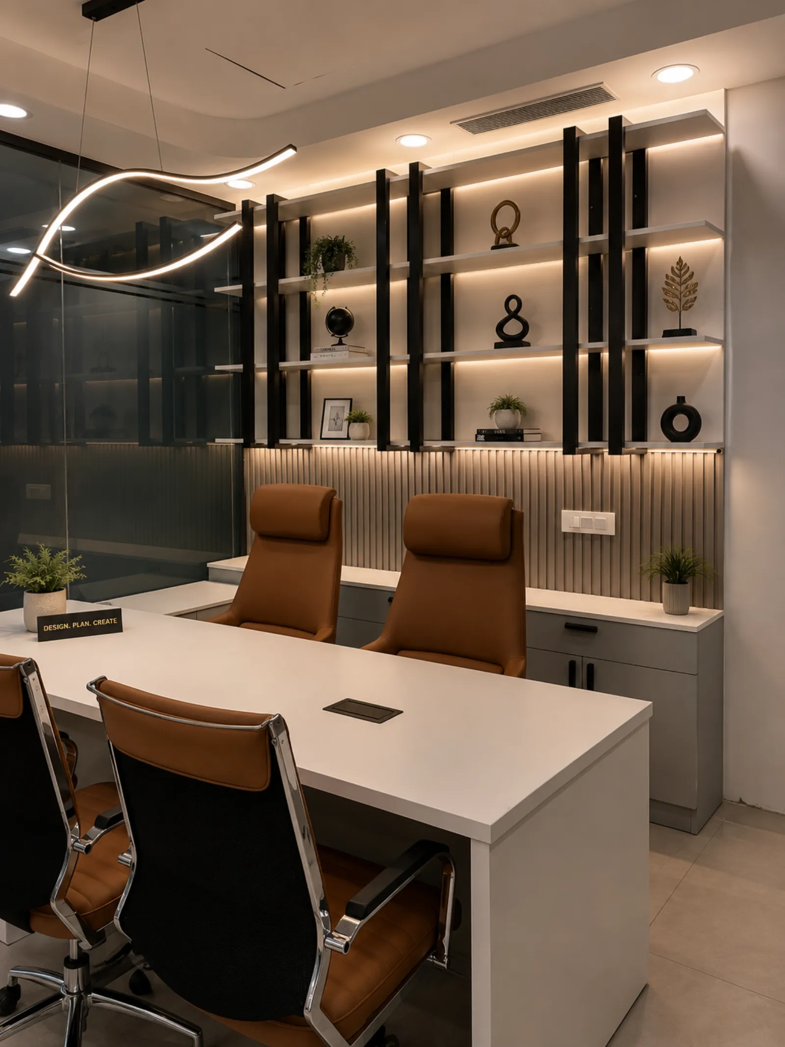 Executive cabin with black display shelving and tan leather chairs